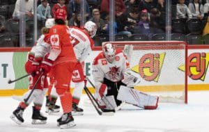 PHOTO 3 SCRAMBLE IN FRONT OF MAC CARRUTH, British Ice Hockey