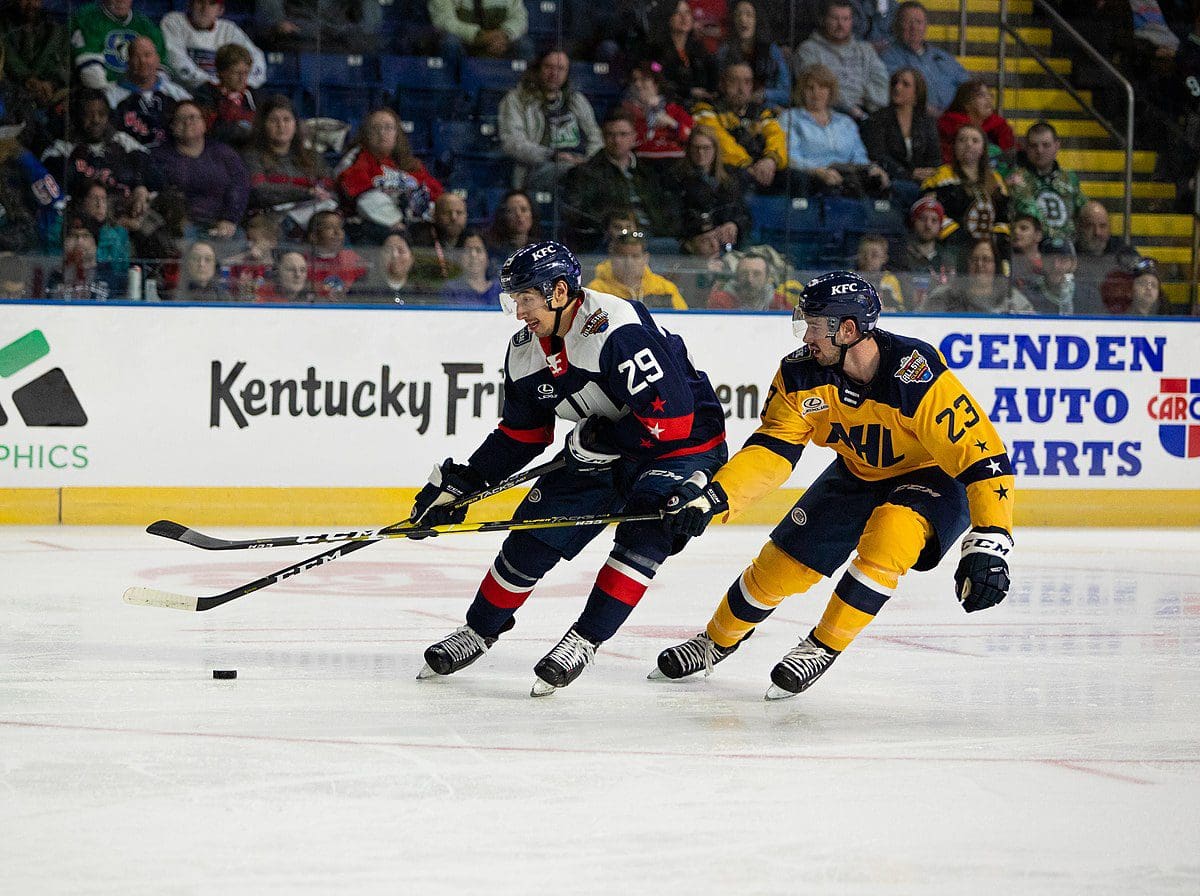 Jordan Kyrou (left), playing in the 2019 AHL All-Star Game (Image: AHL / Wikimedia Commons)